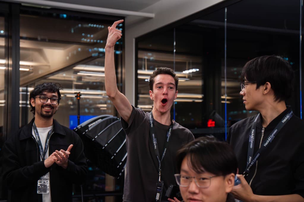 Hackers celebrating at HackAI Toronto